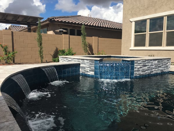 raised spa sheer descent swimming pool design