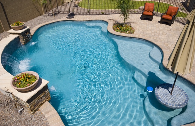CONSIDER PLANTING POCKETS IN YOUR POOL DESIGN
